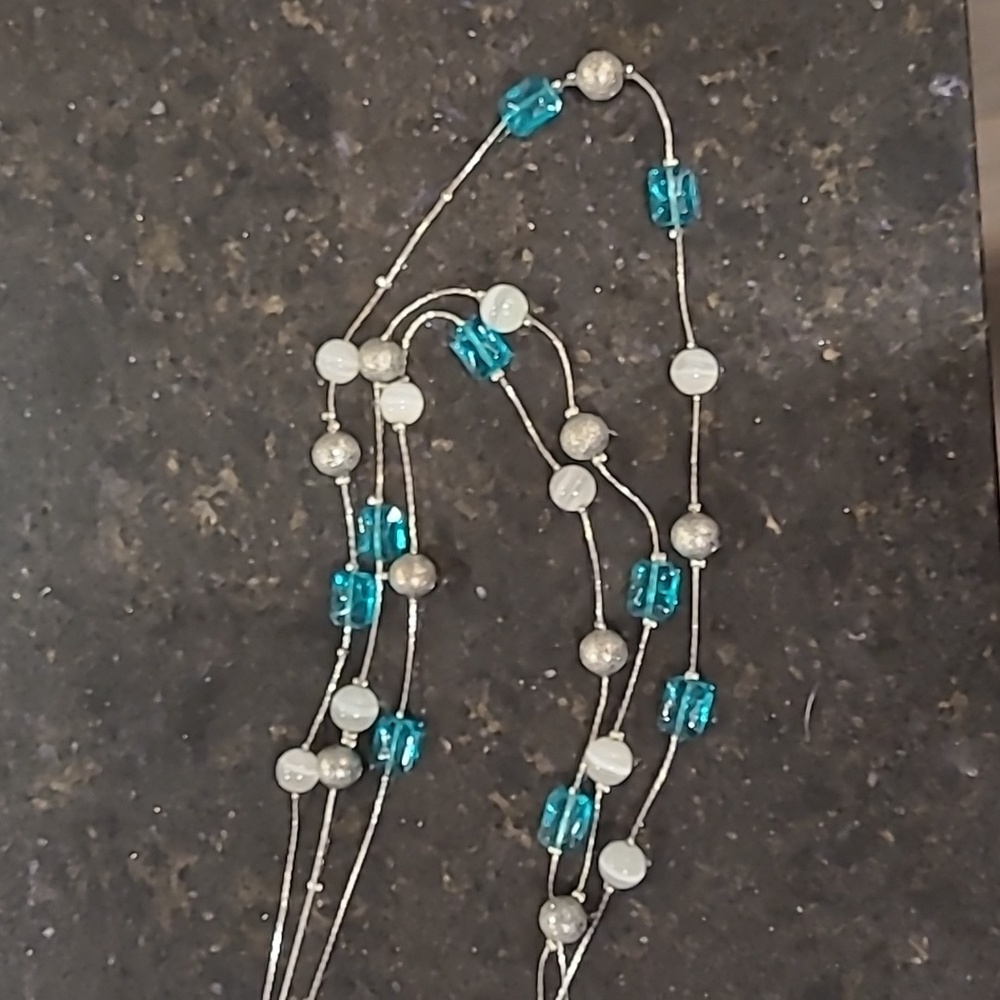 Women's necklace silver and aqua/turquoise colours.